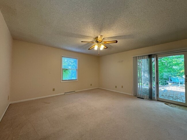 Building Photo - Beautiful Duplex Located in Serene, Wooded...