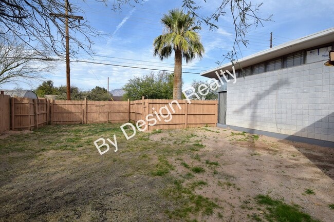 Building Photo - Sun-Drenched Mid-Century Living Near Garden District