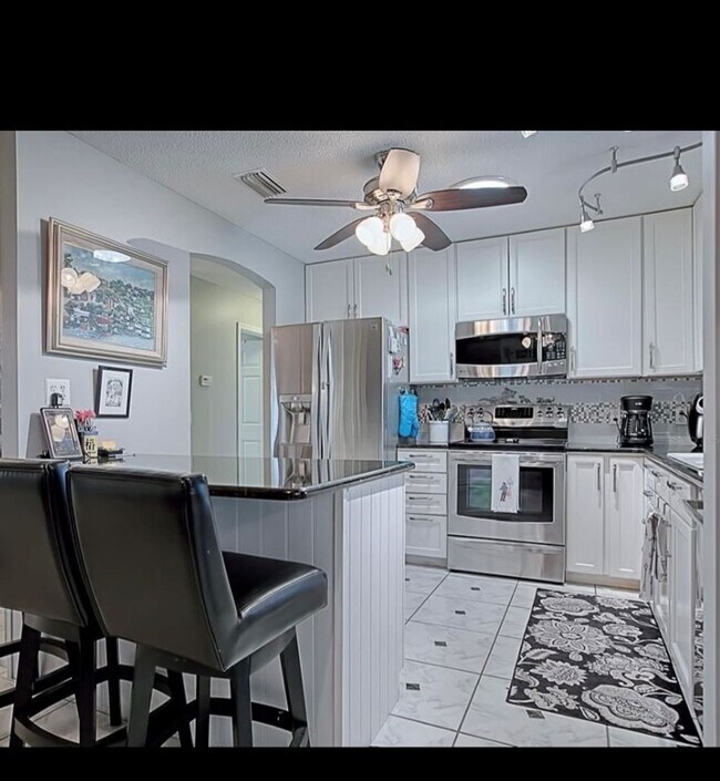 Building Photo - Spectacular Fully Furnished SEASONAL Home with Golf Course views and pool*