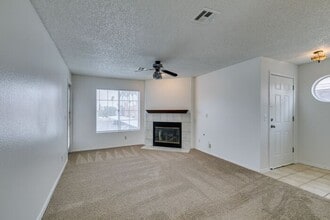 Building Photo - Charming Second-Floor Condo with Two Bedrooms and Fireplace