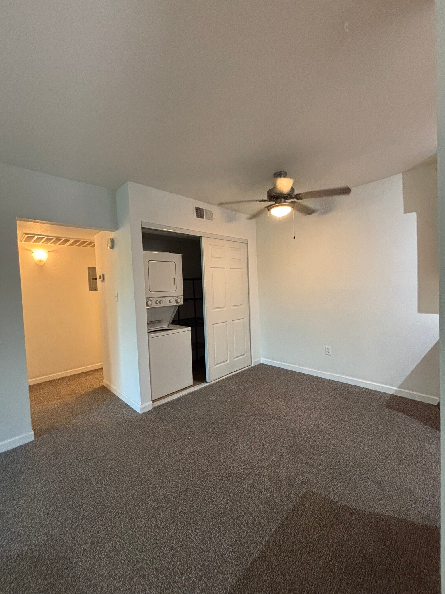 In-unit washer/dryer and dining area. - 5877 N Granite Reef Rd