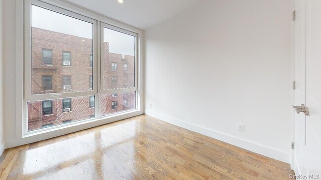 Building Photo - 138-28 Queens Blvd