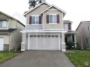 Building Photo - Beautiful Home located in a gated communit...