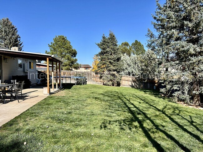 Building Photo - 9722 W Polk Dr