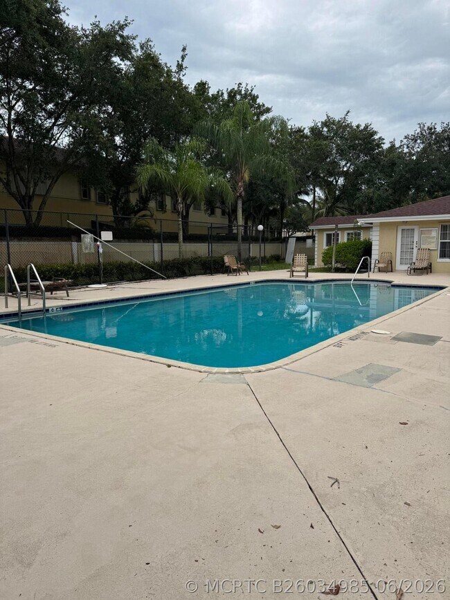 Building Photo - 1803 Palm Beach Trace Dr