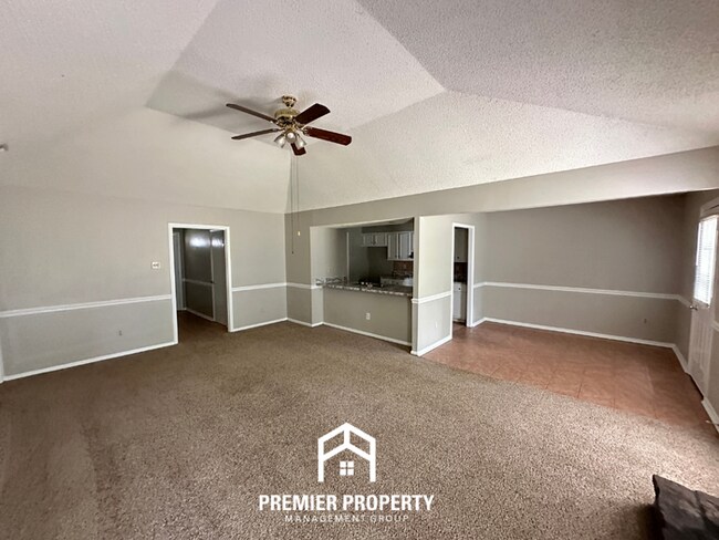 Building Photo - Charming 3BR/2BA in Country Brook | Vaulted Ceilings, Fireplace & Fenced Yard
