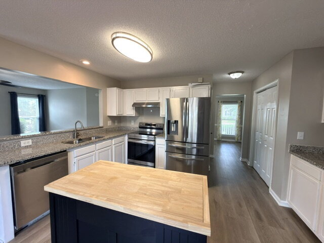 Building Photo - Spacious 4BR Home with Fenced Yard, Community Pool & 2-Car Garage