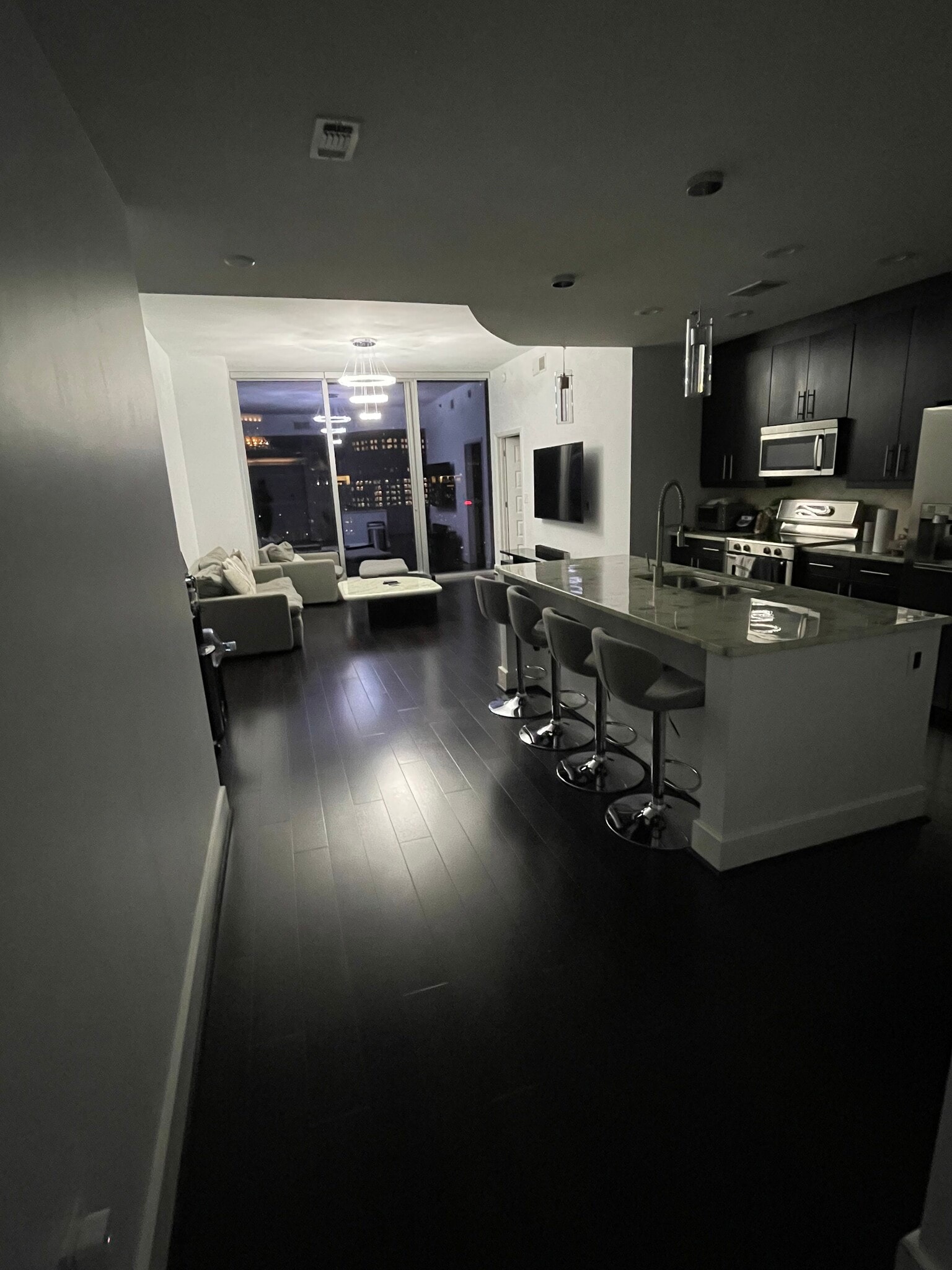 Living Room + Kitchen - Nightview - 1080 Peachtree St NE