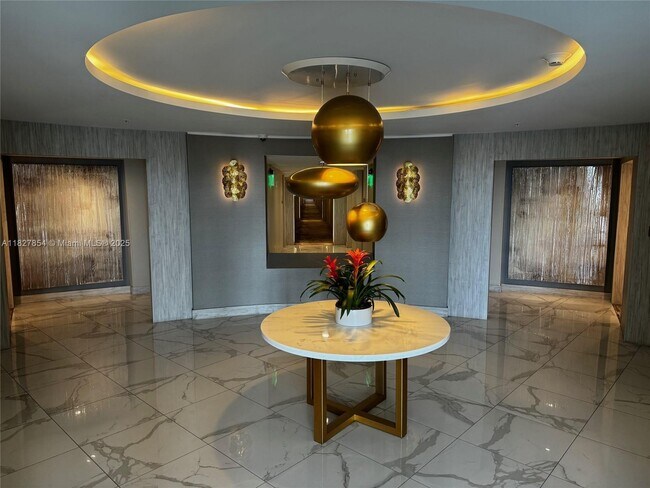 Building Photo - 10275 Collins Ave
