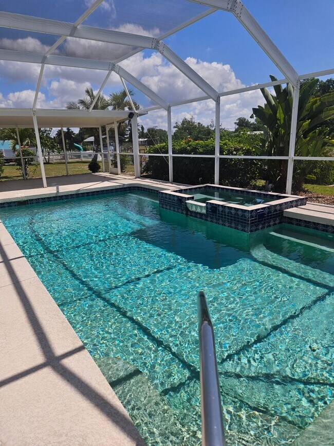 Building Photo - Port Charlotte Waterfront salt water pool annual rental