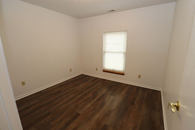 Building Photo - Discover this well-maintained 3-bedroom, 2-bath home in Indianapolis featuring an attached garage...