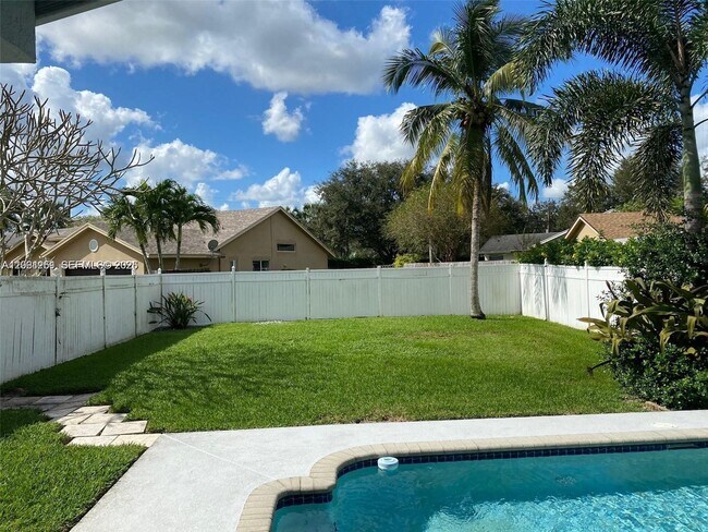 Building Photo - 8965 SW 59th Ct