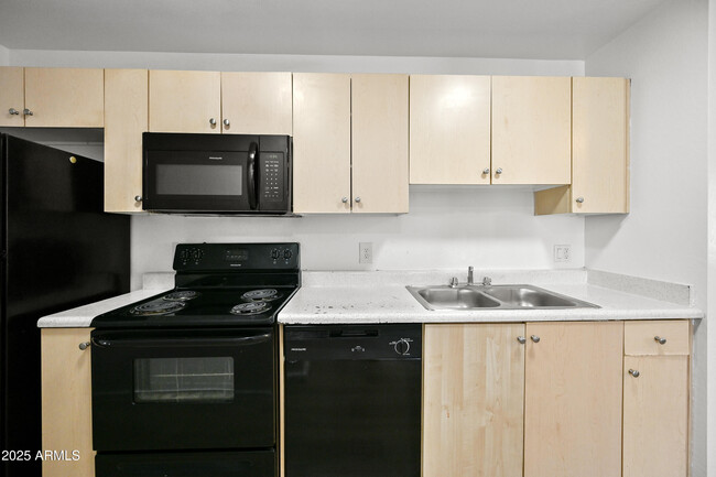 Building Photo - 3065 N 67th Ave
