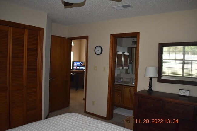 Master Bedroom facing toward living room downstairs - 3126 Station Ct