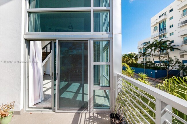 Building Photo - 7700 Collins Ave