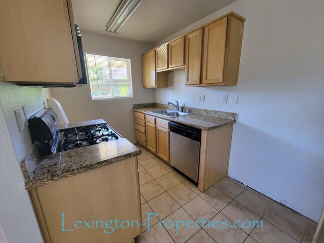 Building Photo - Beautifully Remodeled, 2BD/1BA, Condo Avai...