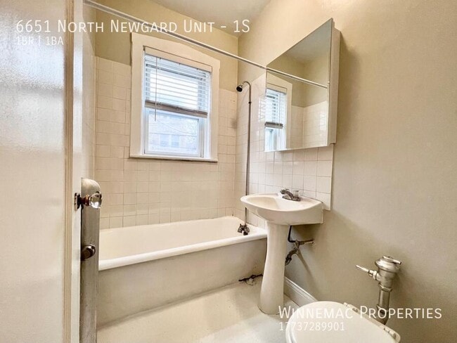 Building Photo - 6651 N Newgard Ave