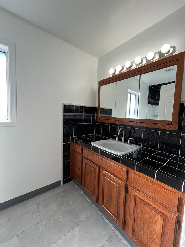 Building Photo - Reseda 4+3 w/fireplace, vaulted ceilings, new flooring, solar panels, + pool!