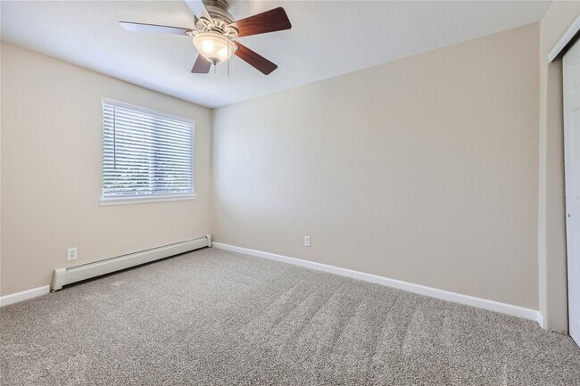 Building Photo - Top-floor, 2-bed 1-bath condo located near the highly desirable Old Town Arvada!