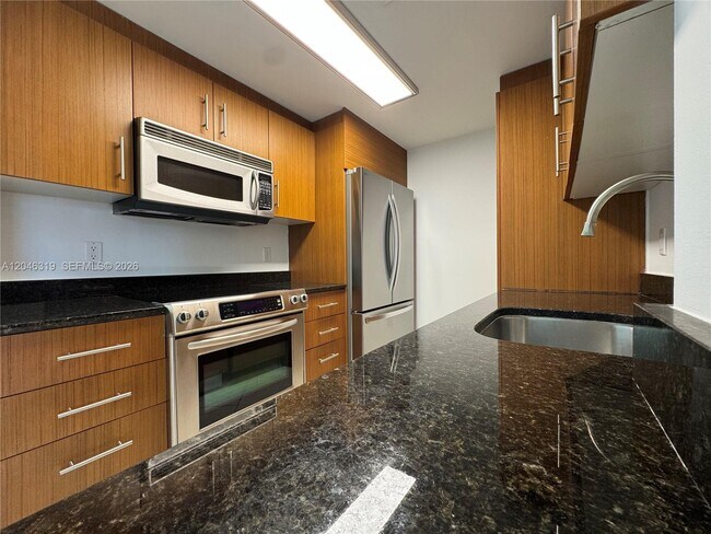 Building Photo - 10275 Collins Ave