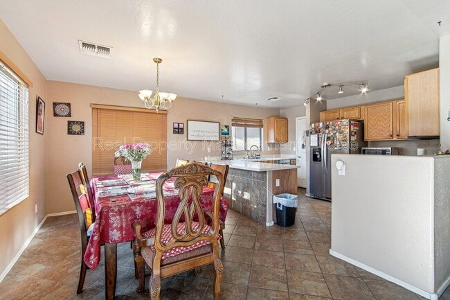 Building Photo - 12571 W Mauna Loa Ln