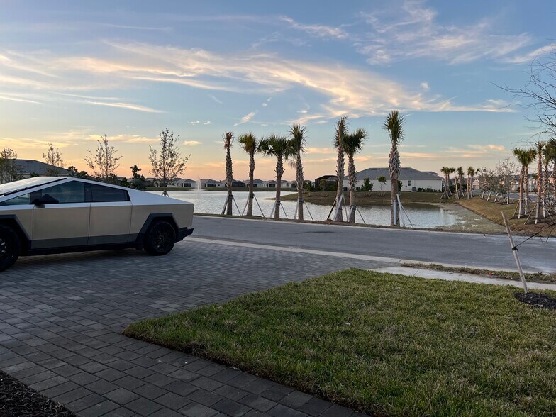 Water view from front door (water in front and back of home) - 8006 Lakes Edge Ln