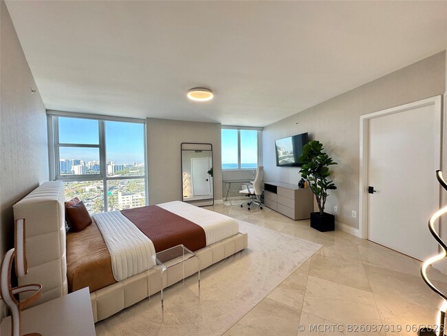 Building Photo - 18201 Collins Ave