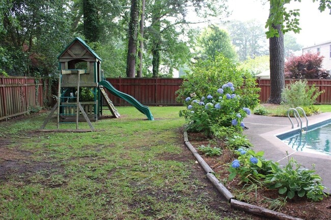 Building Photo - Spacious 4-Bedroom Home with Pool! "ASK ABOUT OUR ZERO-DEPOSIT OPTION"