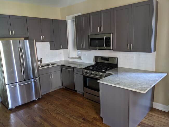 Building Photo - 1630 N Drake Ave