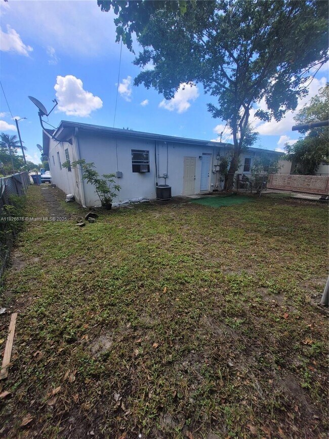 Building Photo - 1235 NW 58th Ave