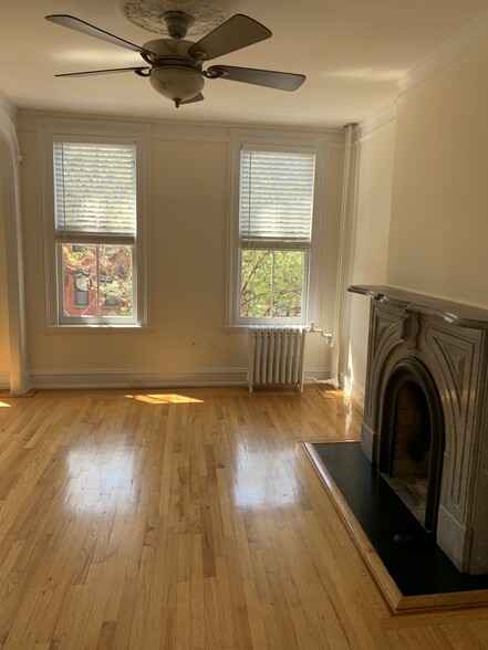 Decorative fireplace, hardwood floors - 284 Pavonia Ave