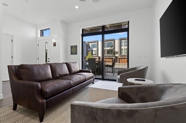 Building Photo - FURNISHED RENTAL: Luxury Townhome in Exclu...