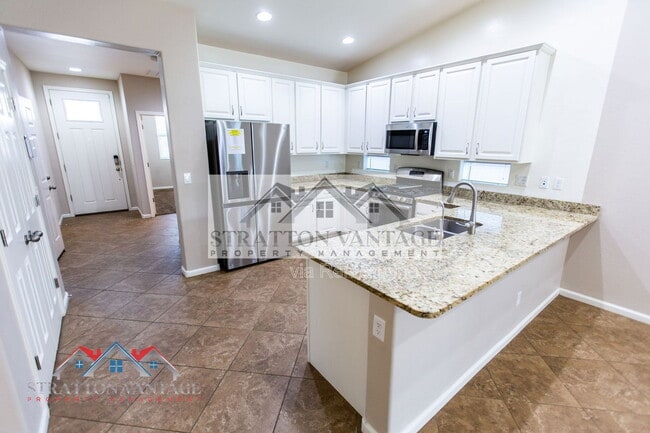 Building Photo - 7465 E Osage Ave