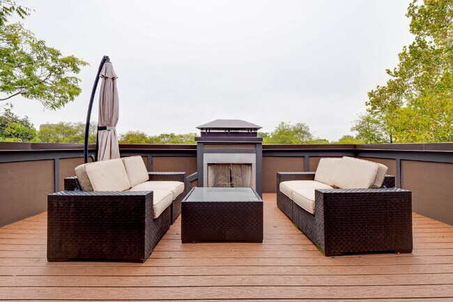 Building Photo - Luxury 12 South Brownstone with Courtyard | Rooftop Deck with Fireplace & Scenic Views | 2-Car Ga...