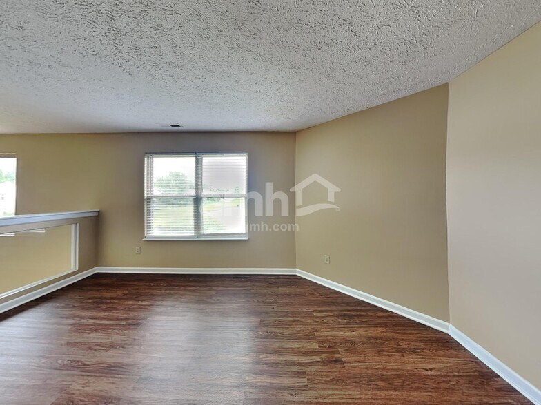 Building Photo - 6591 W Irving Dr