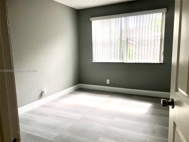 Building Photo - 8761 Wiles Rd