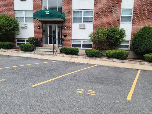 Building Photo - Off Street Parking - Short distance to T stop and Whole Foods - Updated kitchen and bathroom