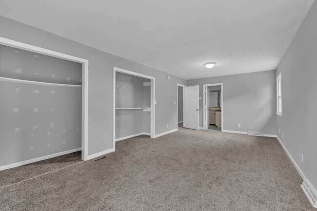Building Photo - spacious 4-bedroom, 2.5-bath home featuring a 2-car garage and fresh updates throughout.