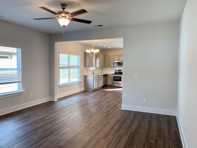 Building Photo - One level home with GARAGE and FENCED BACKYARD!