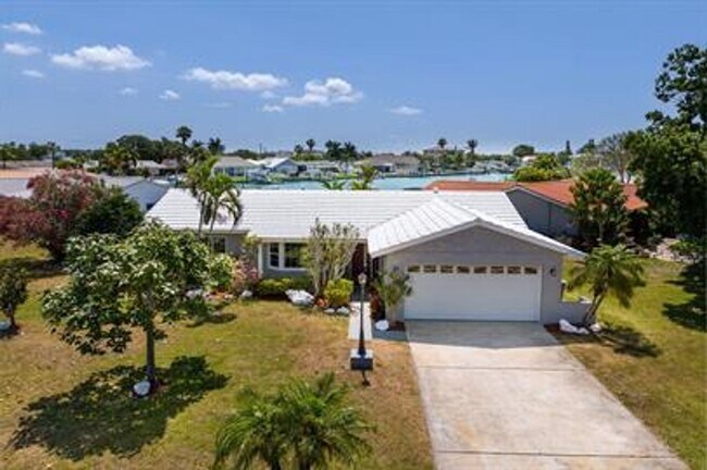 Spacious Waterfront Home on Isle -  Spacious Waterfront Home On Isle Of Capr Treasure Island Fl Building Photo 