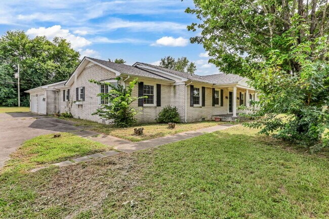 Building Photo - spacious 4-bedroom, 2.5-bath home featuring a 2-car garage and fresh updates throughout.