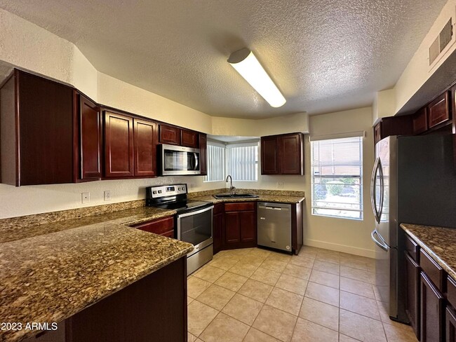 Building Photo - 8787 E Mountain View Rd