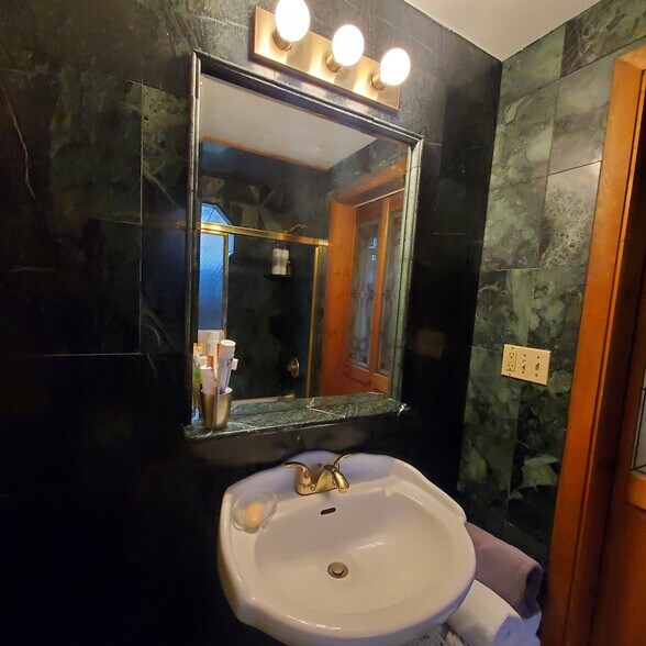 Marble tile bathroom - 191 Elliot St