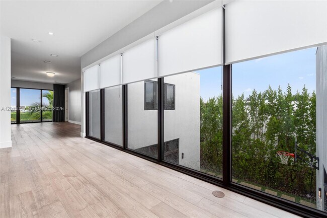 Building Photo - 16529 Botaniko Dr N
