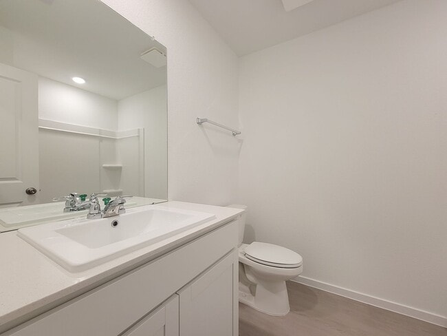 Building Photo - This lovely single-level home showcases a spacious open floorplan shared between the kitchen, din...