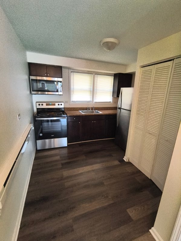 Building Photo - 7617 S Colfax Ave