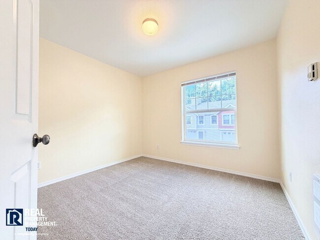 Building Photo - Spacious 4-Bedroom Townhome in Alicia Meadows | Garage, Patio & Pet Friendly