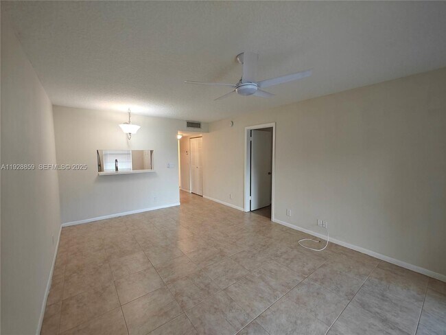 Building Photo - 8770 Royal Palm Blvd