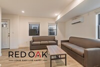 Building Photo - ~2 Months FREE~ Stunning Four Bedroom with...