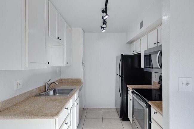 Building Photo - Welcome to Sunrise located in the Heart of...
